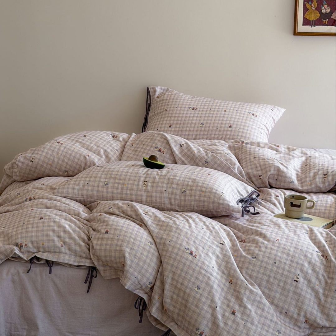 Cozy bedding set made of cotton percale with fine Vichy check and bow decoration