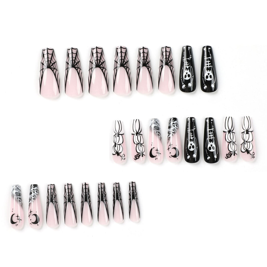 Artificial nail art in Halloween style with graffiti designs Stornfield