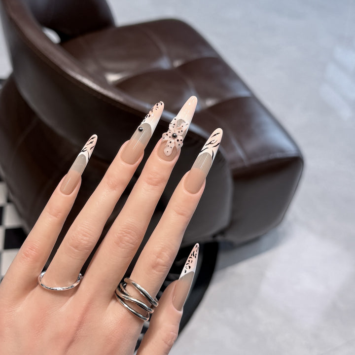 Artistic Stiletto Nail Art Set with Elegant Decorative Elements Stornfield