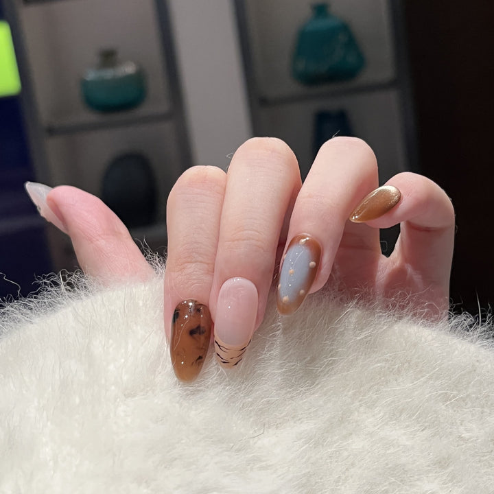 Artistic Press-On Nail Set with Unique Abstract Design Elements Stornfield