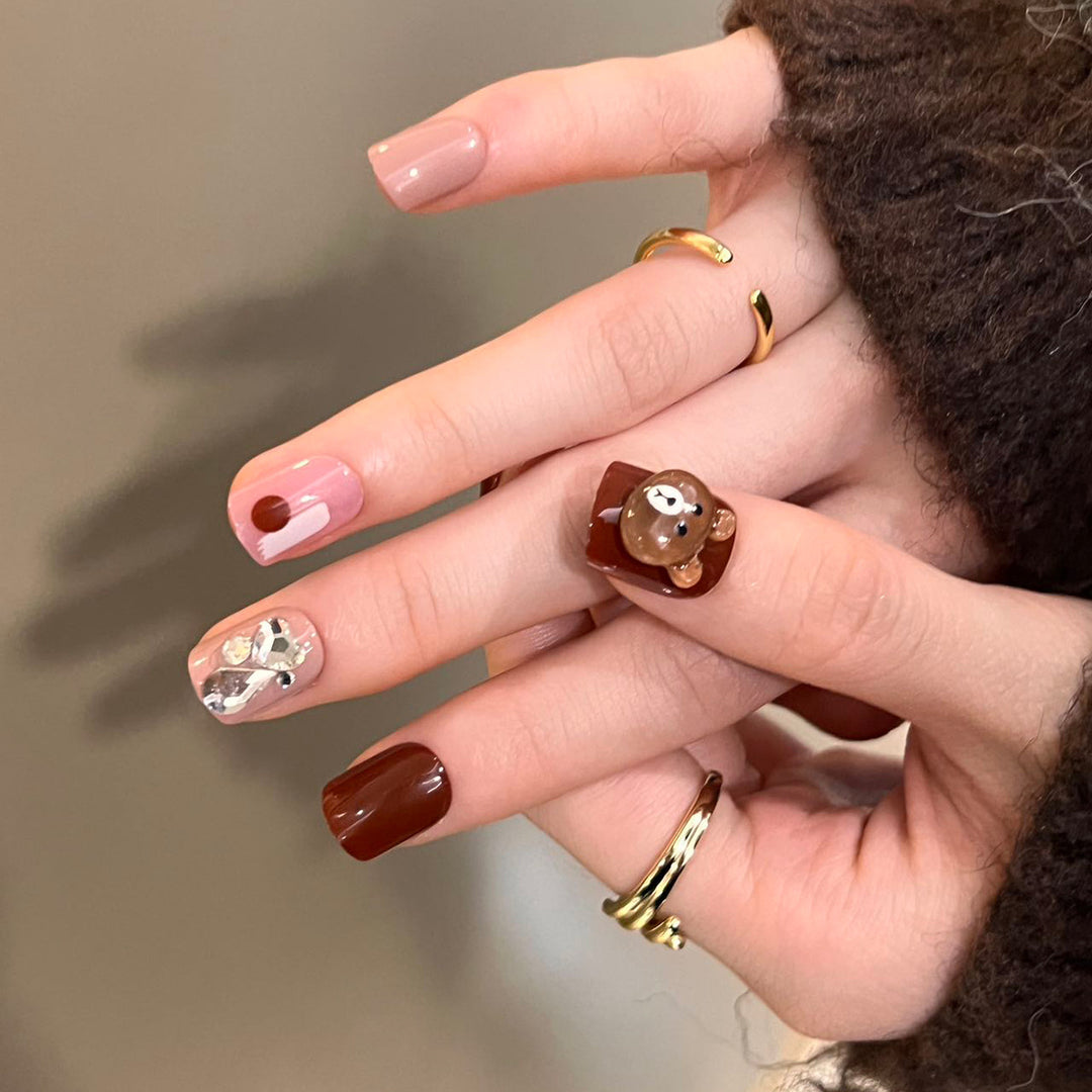 Artful nail extensions with an elegant leaf pattern Stornfield