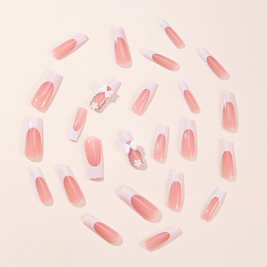 Artificial nail set with dreamy 3D flowers and bow decorations Stornfield
