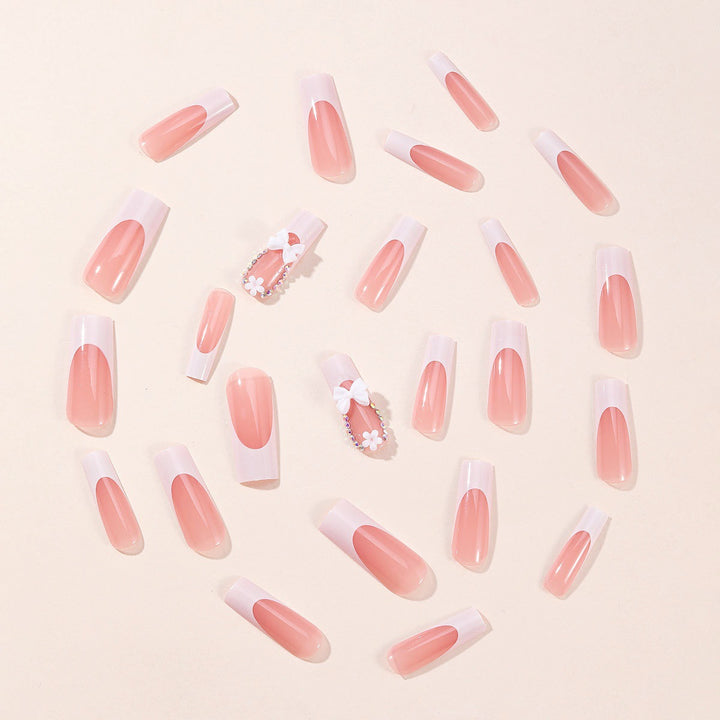 Artificial nail set with dreamy 3D flowers and bow decorations Stornfield
