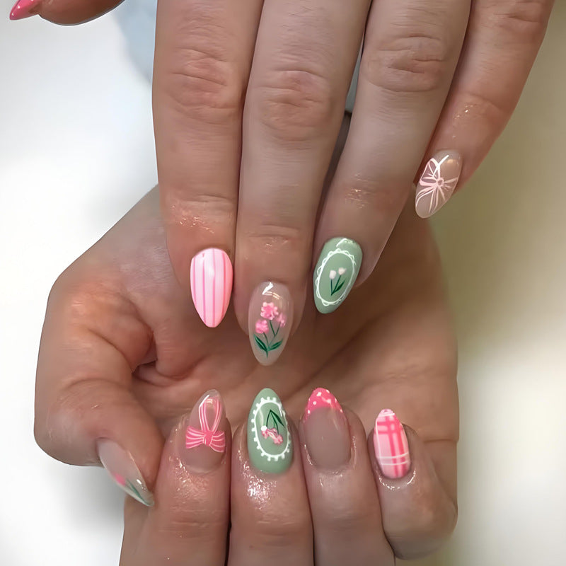 Acrylic nail set with floral and playful designs Stornfield
