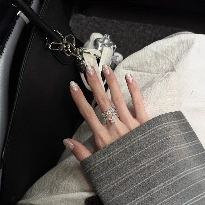 Artificial nails with decorative accents Stornfield