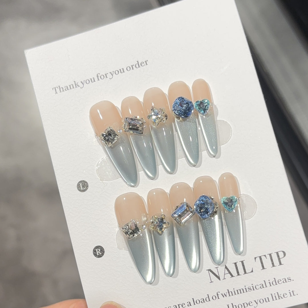 Glamorous artificial nails with sparkling stones Stornfield