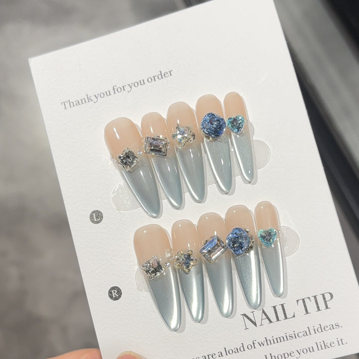 Glamorous artificial nails with sparkling stones Stornfield