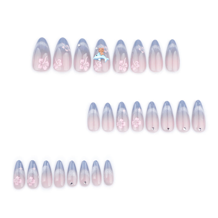 Artful nail extensions with elegant ombré design and floral accents Stornfield