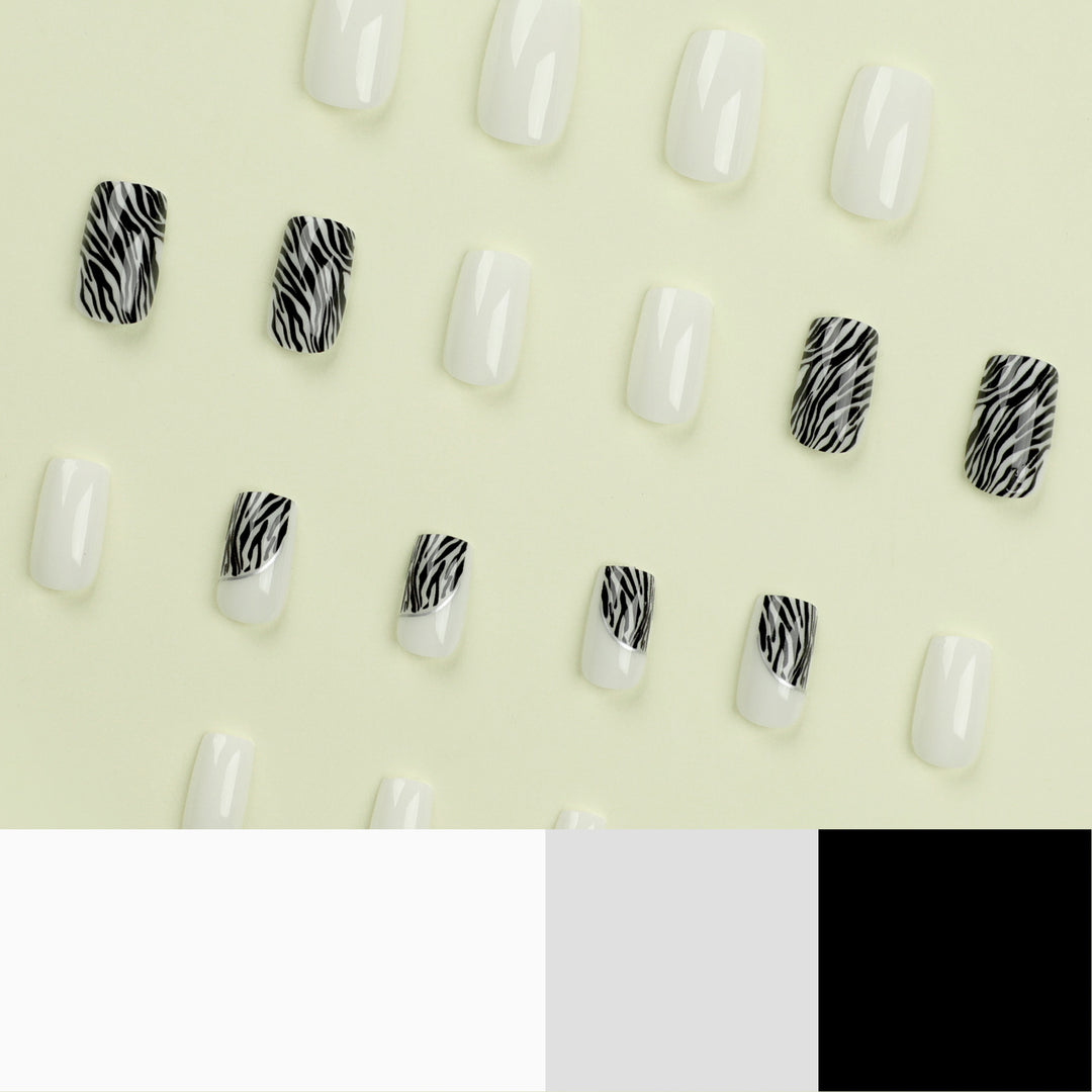 Artful nail extensions with stylish zebra pattern Stornfield