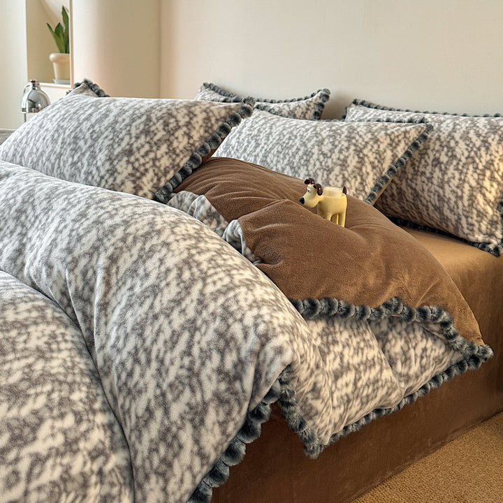 Plush Reversible Leopard-Print Duvet Cover and Pillowcase Set with Pom-Pom Trim