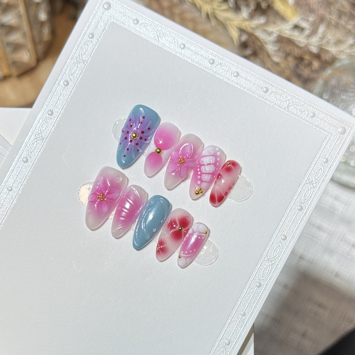 Artistic Press-On Nail Set with Floral and Abstract Designs Stornfield