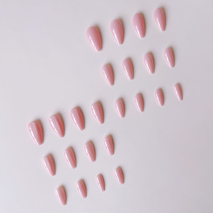 Acrylic nail set with glamorous high-gloss finish and delicate glitter accents Stornfield