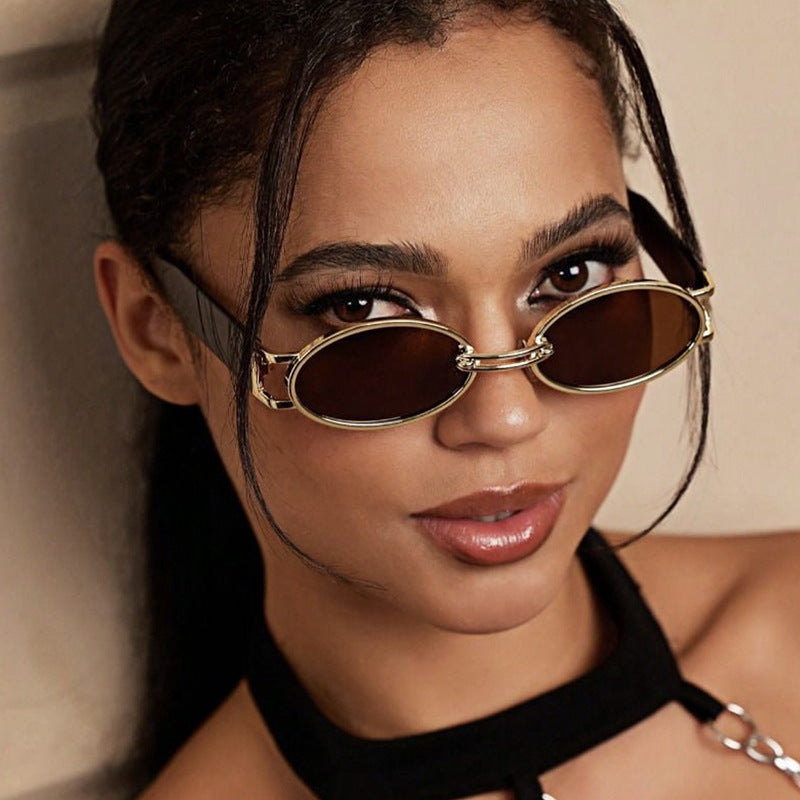 Women oval-shaped sunglasses with golden accents and stylish frame Stornfield