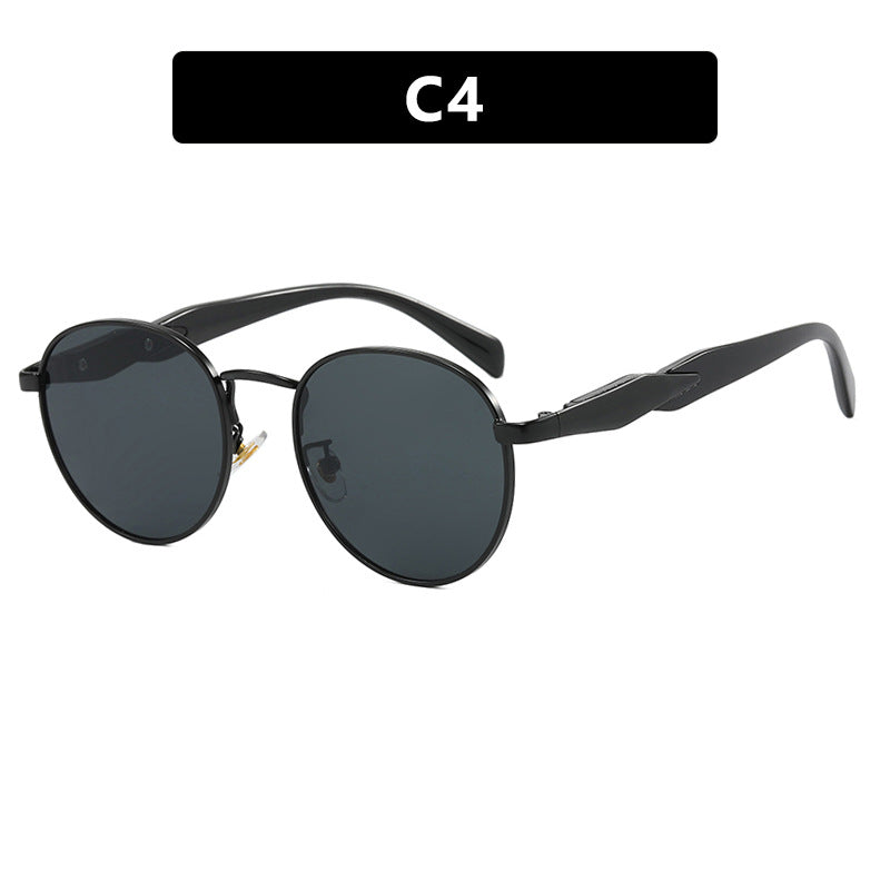 Women's round sunglasses with elegant golden frame and UV protection Stornfield