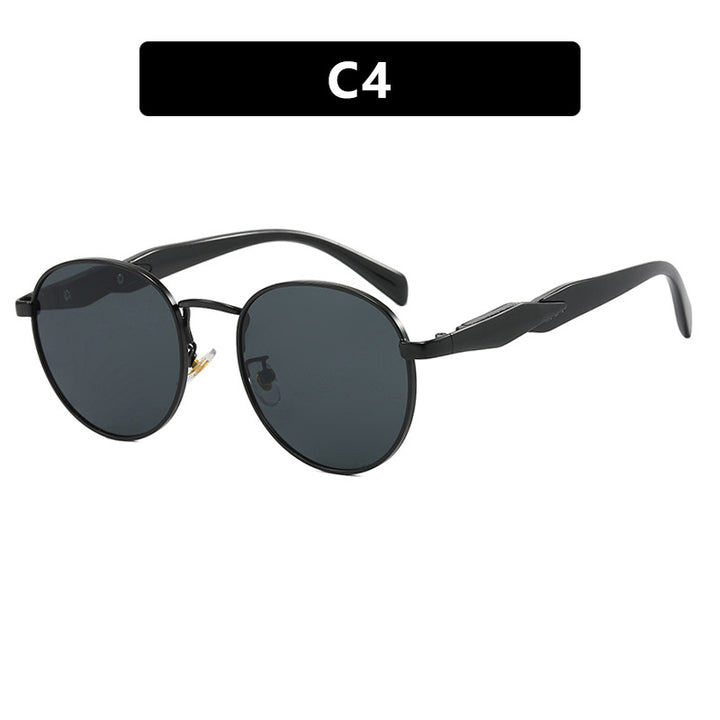 Women's round sunglasses with elegant golden frame and UV protection Stornfield