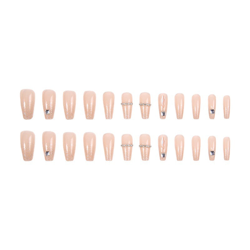 Acrylic nail set with glamorous rhinestone and glitter elements Stornfield