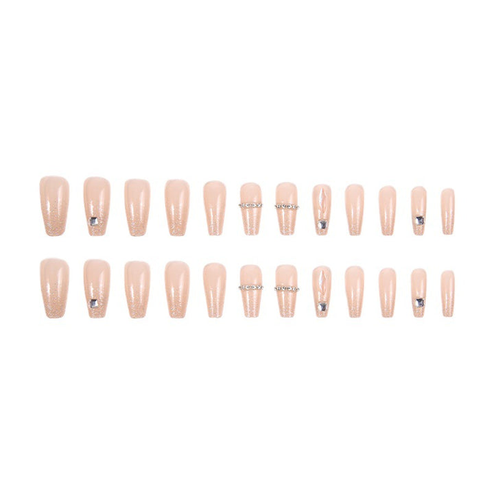 Acrylic nail set with glamorous rhinestone and glitter elements Stornfield