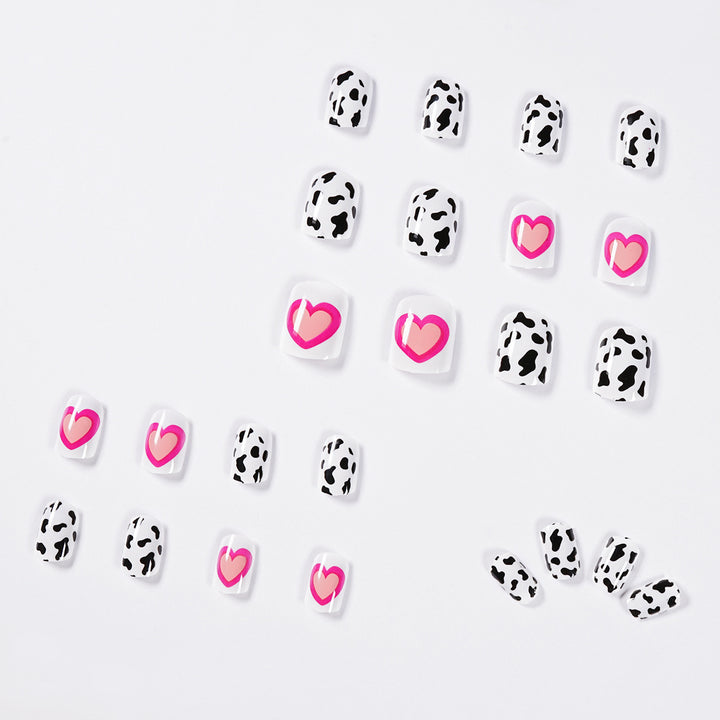 Creative nail art with heart and animal pattern motif Stornfield