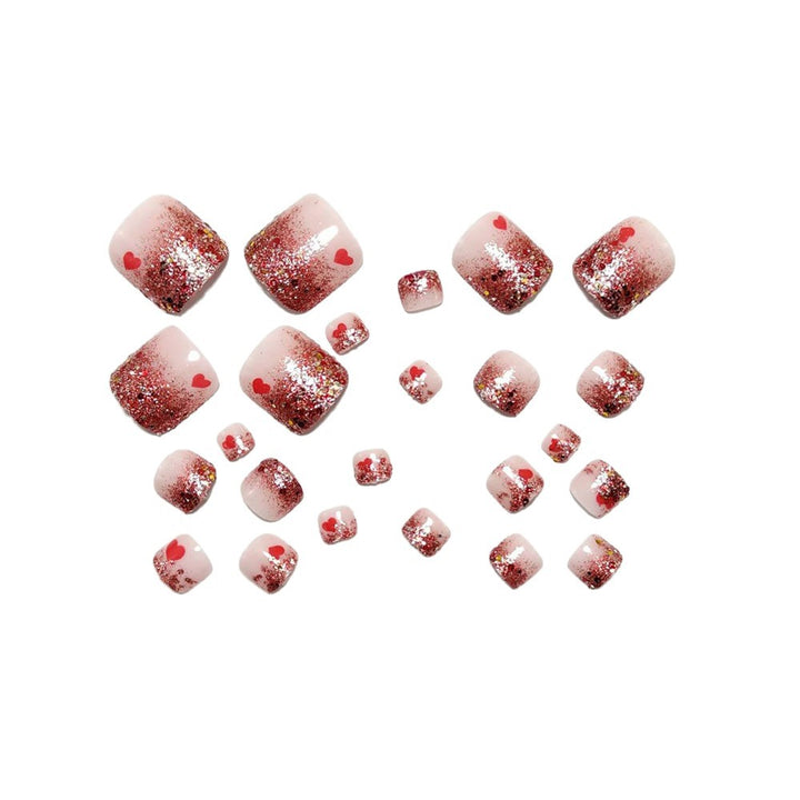 Artificial nails with glitter and heart pattern Stornfield