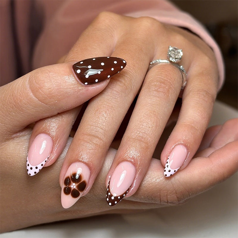 Nail set with elegant dot and flower design Stornfield