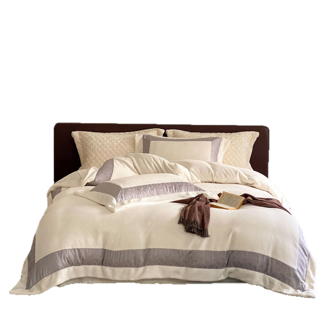Luxurious cotton satin bedding set with quilted decorative border Stornfield