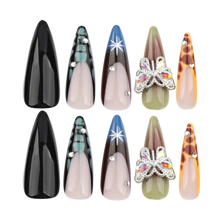 Artful nail extensions with elegant designs and glitter Stornfield