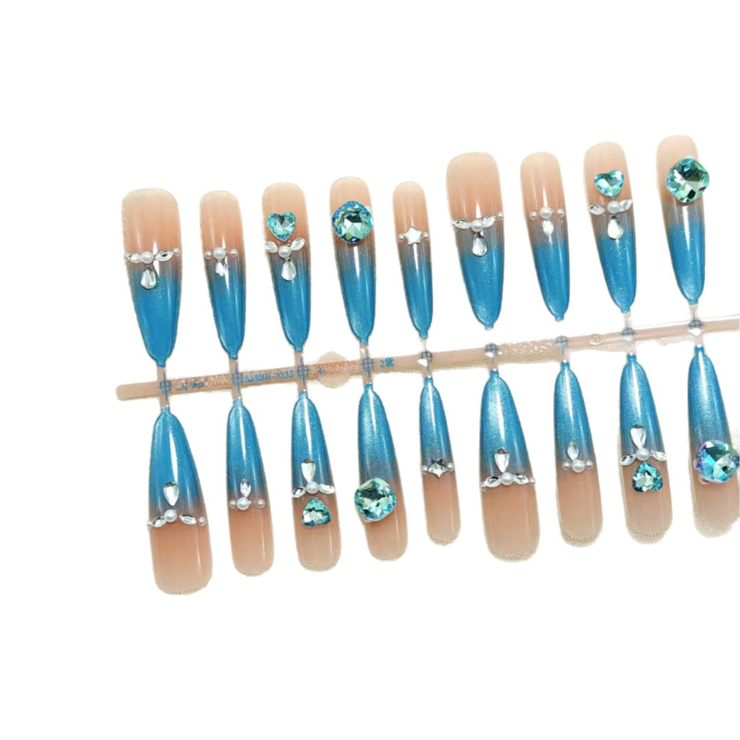 Glamorous artificial nails with sparkling rhinestone elements Stornfield