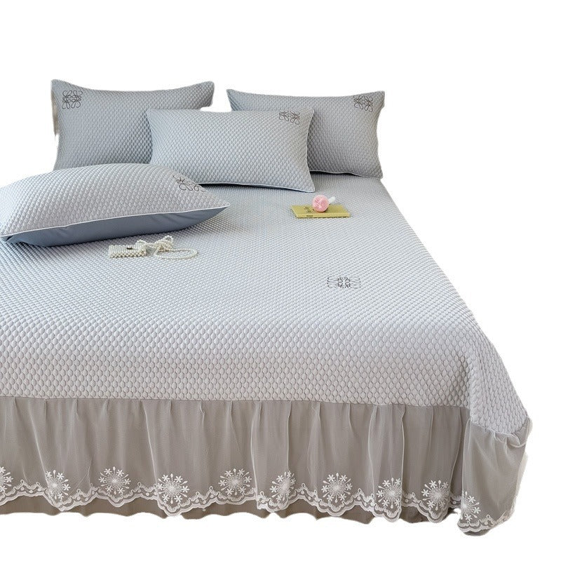 Quilted mattress protector with elastic all-around fit and panda embroidery