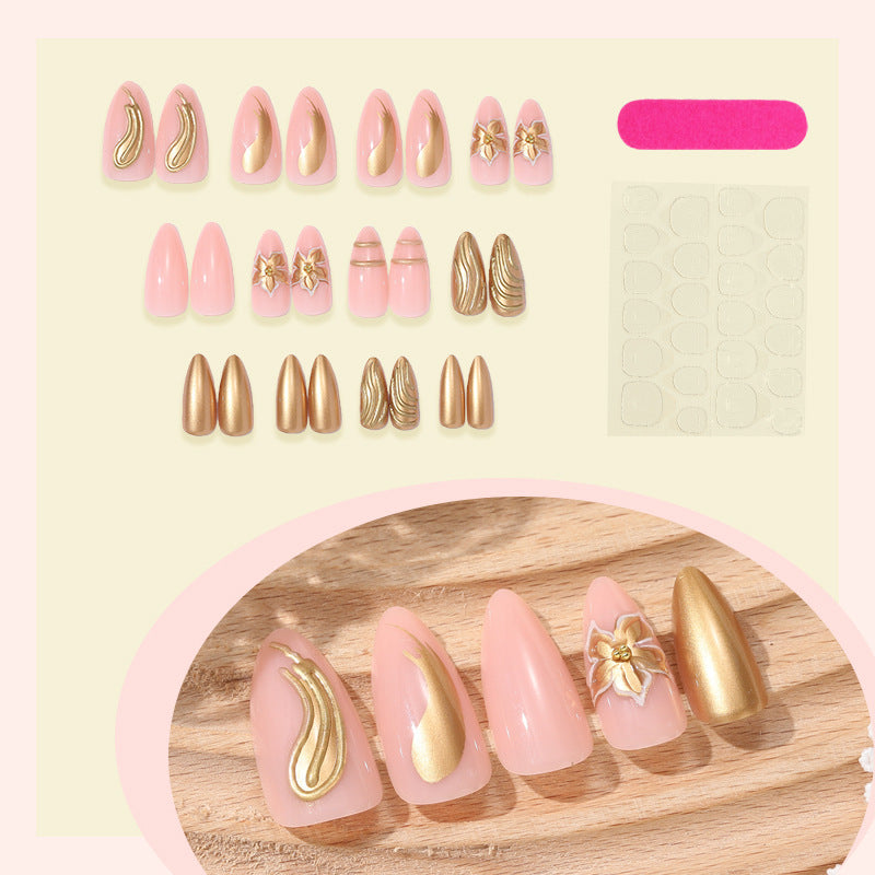 Creative nail art set with luxurious gold embellishments Stornfield