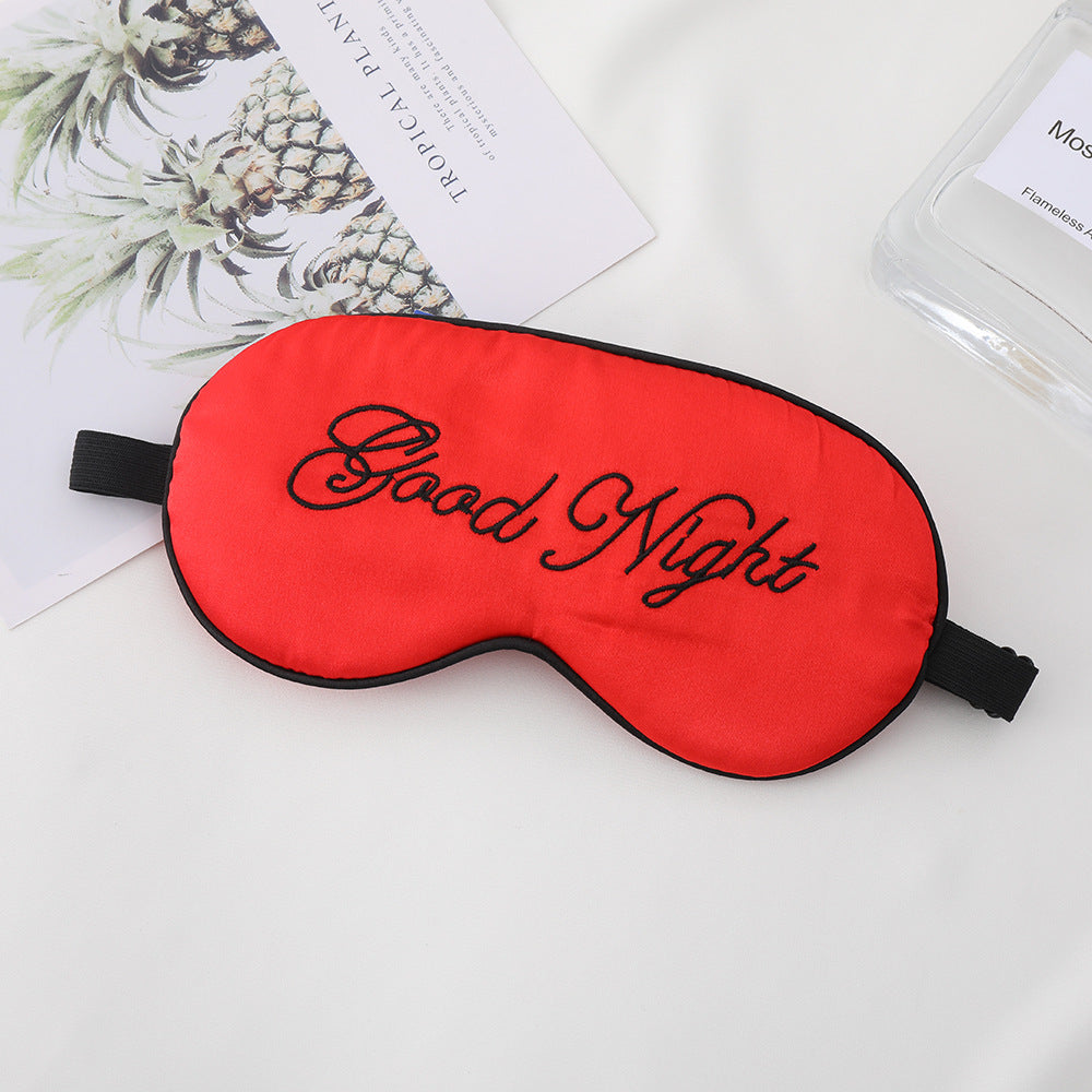 Unisex embroidered contoured sleep mask with decorative text embroidery and adjustable elastic band Stornfield
