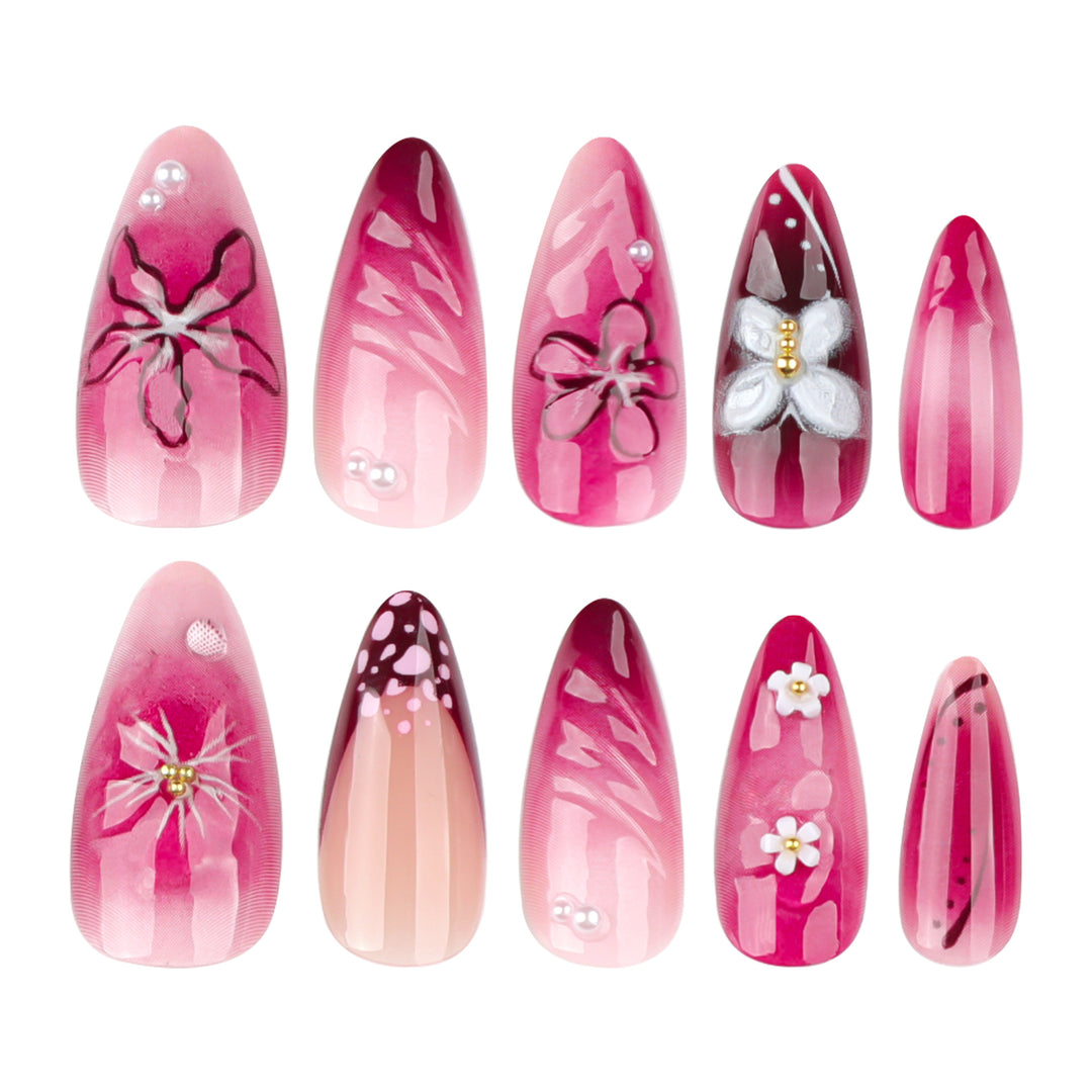 Artful nail extensions with floral details and ombre effect Stornfield