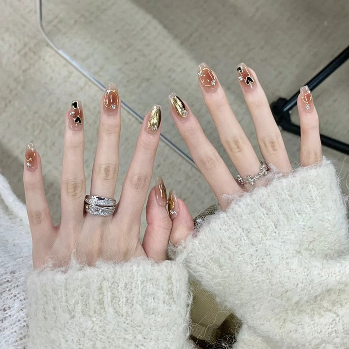 Artistic Press-On Nail Set with Heart and Glitter Accents Stornfield