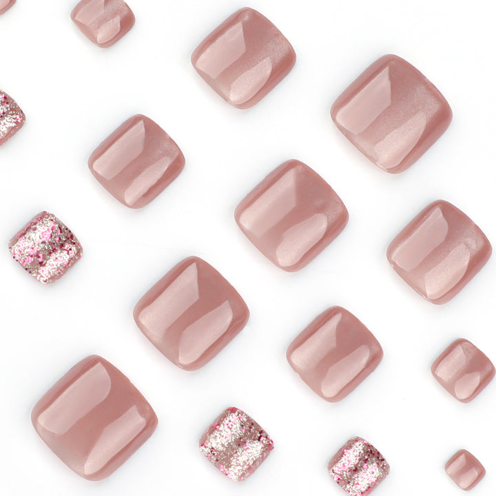 Artistic toenail design with glitter accents Stornfield