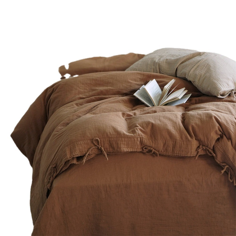 Natural linen bedding set with decorative ties and stonewashed texture