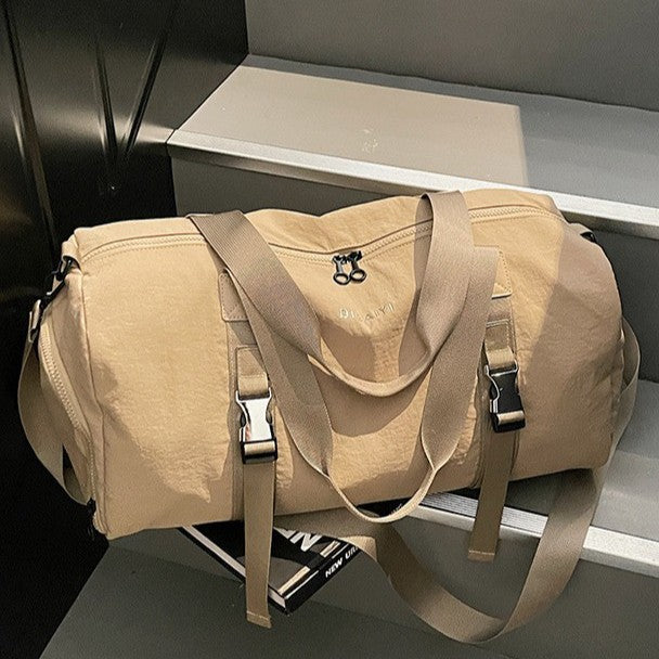 Sporty Duffel Bag with Adjustable Shoulder Strap and Ergonomic Handles Stornfield