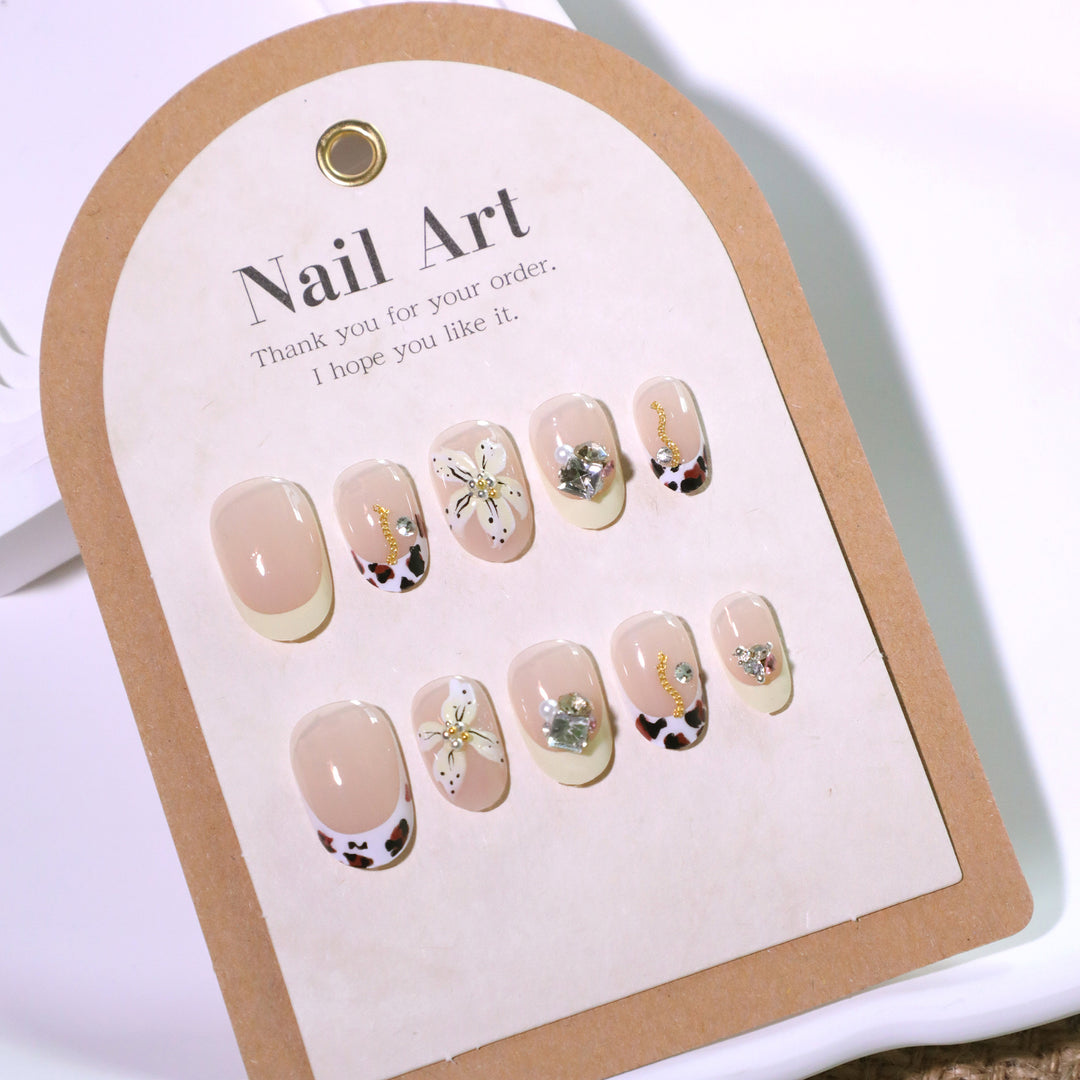 Exclusive nail art with floral design and glitter accents Stornfield