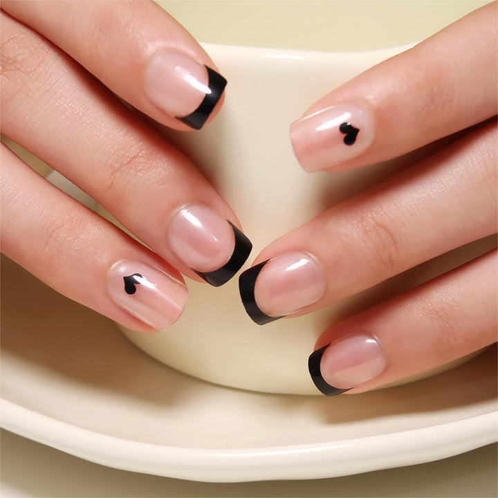 Artful nail extensions with an elegant leaf pattern Stornfield