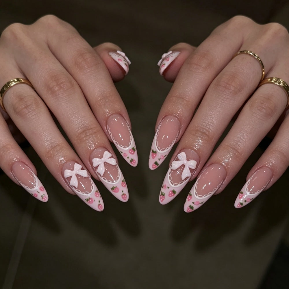 Artificial nails with romantic floral and ribbon motifs Stornfield