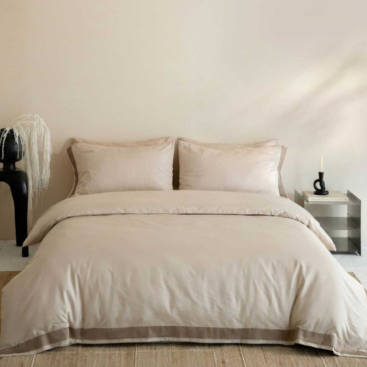 Premium bedding set made of cotton satin with fine cassette trim and hotel closure