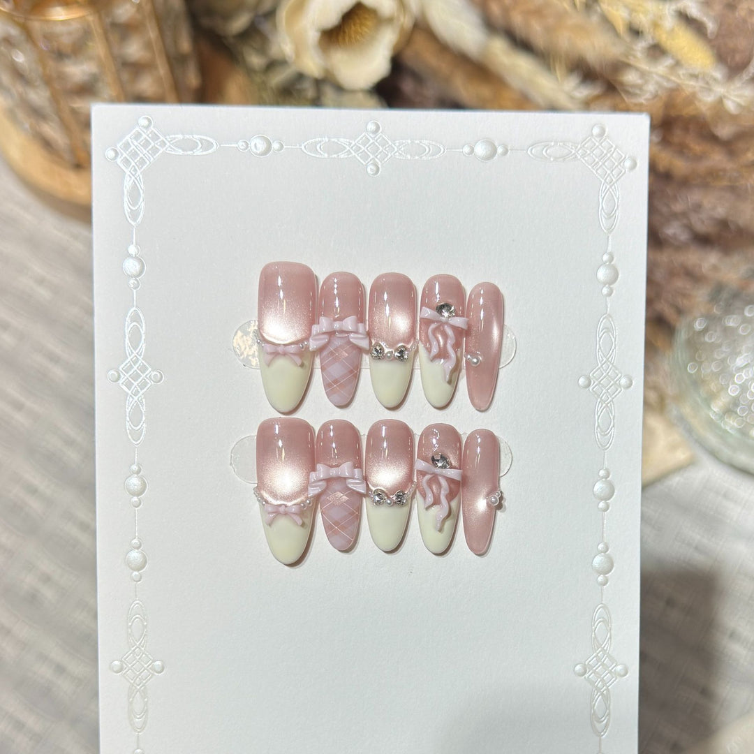 Elegant Stiletto Press-On Nail Set with Decorative Bow and Gem Accents Stornfield