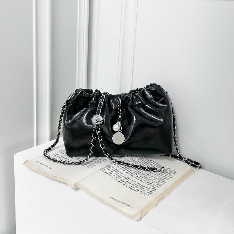 Elegant Chain-Accented Mini Handbag