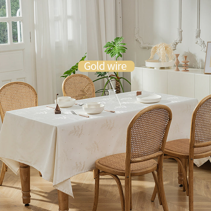 Rectangular premium table linen made of jacquard polyester with subtle frost floral embossing Stornfield
