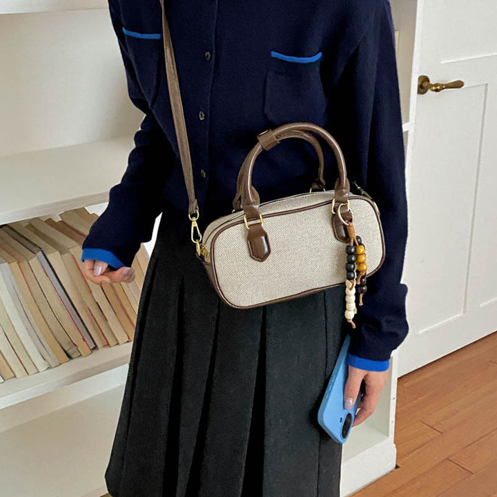 Vintage-Inspired Glossy Handheld Satchel