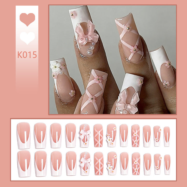 Artistic 3D Nail Tips with Bow Motifs Stornfield