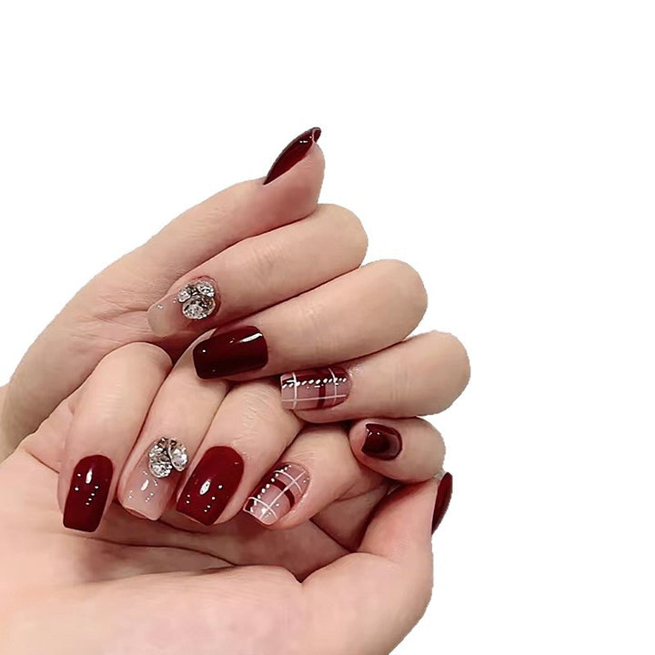 Artificial nail set with elegant, shimmering design and creative accents Stornfield