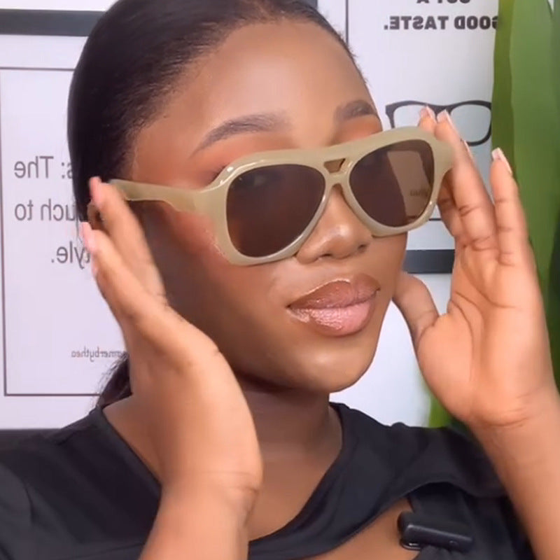 Ladies fashionable sunglasses in innovative design with wide frame Stornfield