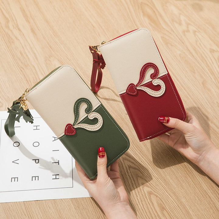 Stylish wallet with heart appliqués Stornfield