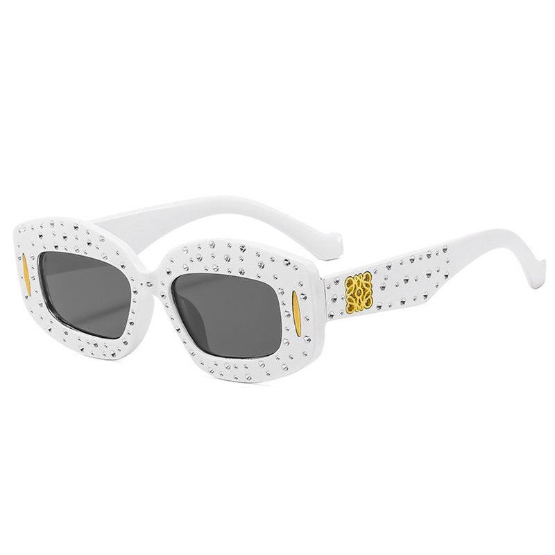 Women striking sunglasses with glamorous rhinestone details Stornfield