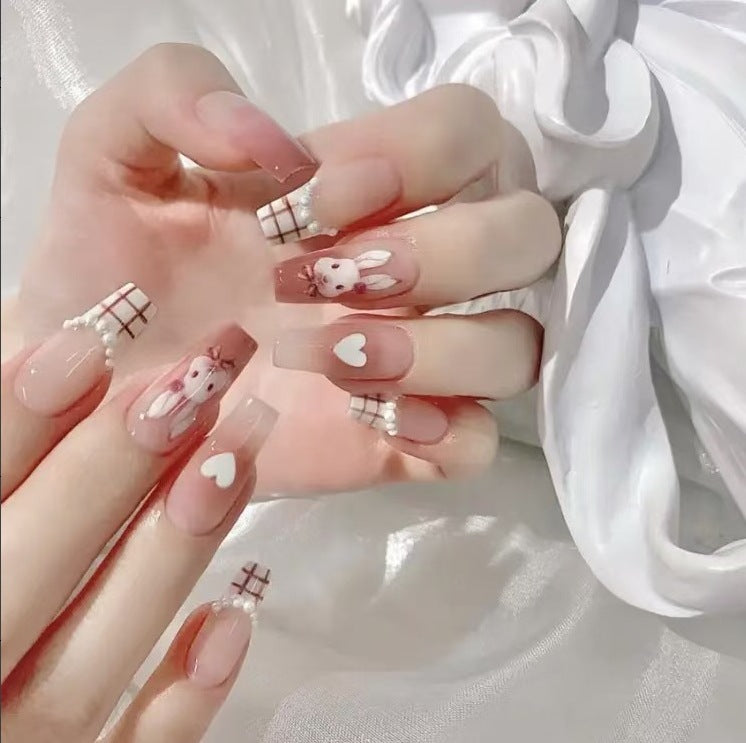 Artful Nail Art with Cute Bunny Pattern Cold Stornfield