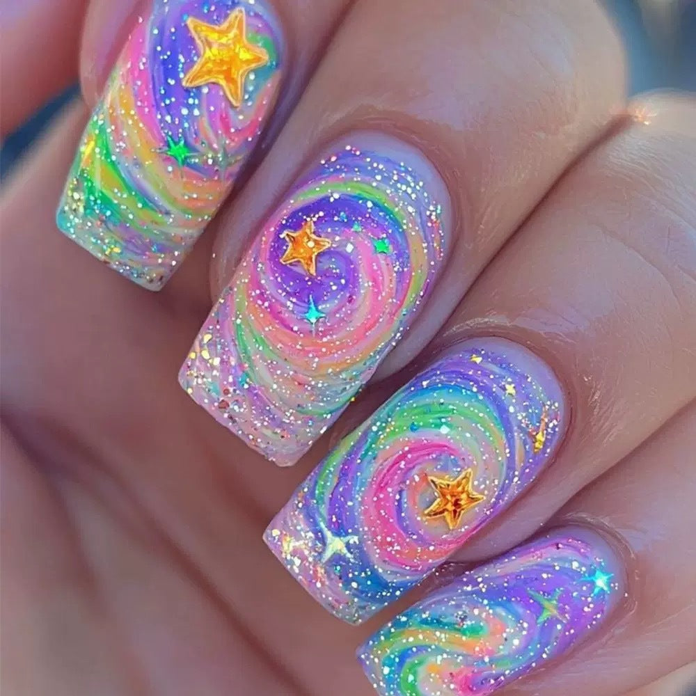 Glittering artificial nail set with colorful spiral design and star accents Stornfield